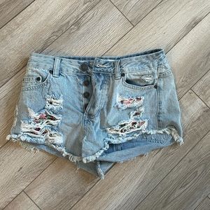 Ripped Jean Shorts with floral pattern